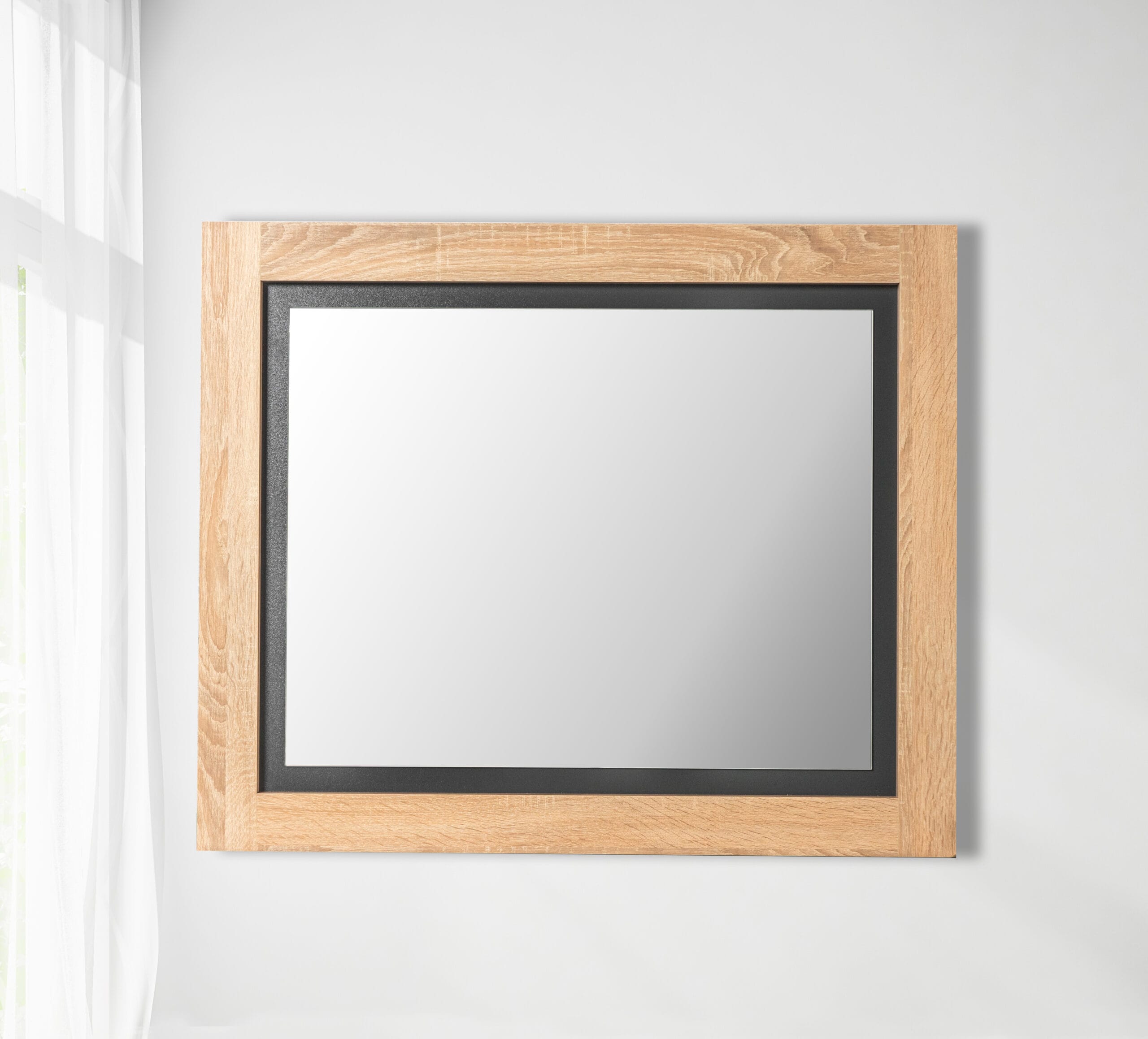 An elegant bedroom mirror with Oak Grey frame