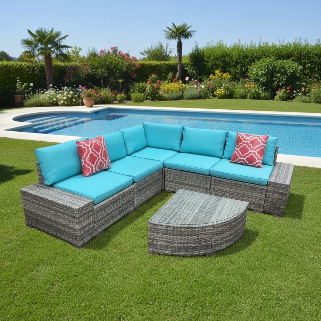 Grey corner garden sofa with blue cushions and matching coffee table